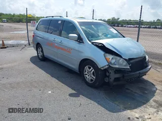 2006 Honda Odyssey EX-L with VIN 5FNRL38716B103035, listed as a IAAI auction lot 42092668 with 264,431 mi miles and . Bid and sale history available at DreamBid. Image 1.
