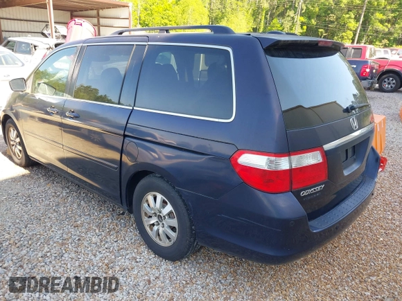 2007 Honda Odyssey Touring with VIN 5FNRL38807B023395, listed as a IAAI auction lot 42047062 with 240,552 mi miles. Bid and sale history available at carsss.com. Image 3.