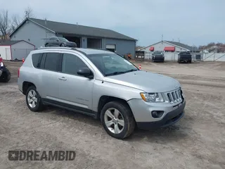 2012 Jeep Compass Sport with VIN 1C4NJDBB4CD624163, listed as a IAAI auction lot 42025783 with 148,928 mi miles. Bid and sale history available at carsss.com. Image 1.