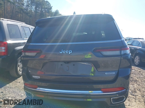 2022 Jeep Grand Cherokee Overland z VIN 1C4RJJDG6N8570854, wystawiony jako IAAI lot #40878737 z przebiegiem 19 947 mil mil oraz . Historia ofert i sprzedaży dostępna na DreamBid. Obrazek 17.