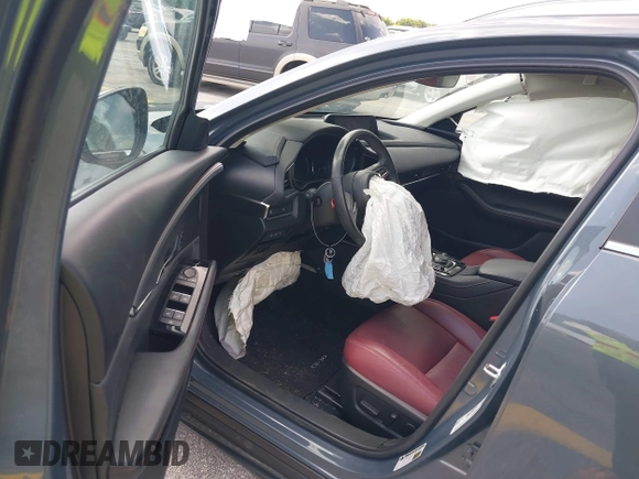 2023 Mazda CX-30 S Carbon Edition with VIN 3MVDMBCM4PM579080, listed as a IAAI auction lot 41941082 with 5,444 mi miles and . Bid and sale history available at DreamBid. Image 5.