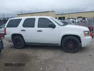 2012 Chevrolet Tahoe Commercial with VIN 1GNLC2E02CR322901, listed as a IAAI auction lot 42679887 with 251,794 mi miles and . Bid and sale history available at DreamBid. Image 14.