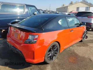 2015 Scion tC with VIN JTKJF5C71FJ006863, listed as a IAAI auction lot 41332681 with 91,559 mi miles. Bid and sale history available at carsss.com. Image 4.