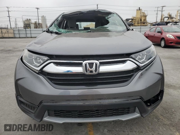 2017 Honda CR-V LX z VIN 2HKRW5H3XHH402429, wystawiony jako Copart lot #57440845 z przebiegiem 17 617 mil mil oraz Szkoda całkowita • Salvage title. Historia ofert i sprzedaży dostępna na DreamBid. Obrazek 5.