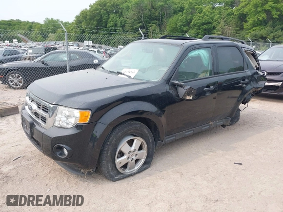 2012 Ford Escape XLT z VIN 1FMCU0DG3CKB39813, wystawiony jako IAAI lot #42378765 z przebiegiem 91 714 mil mil oraz . Historia ofert i sprzedaży dostępna na DreamBid. Obrazek 18.