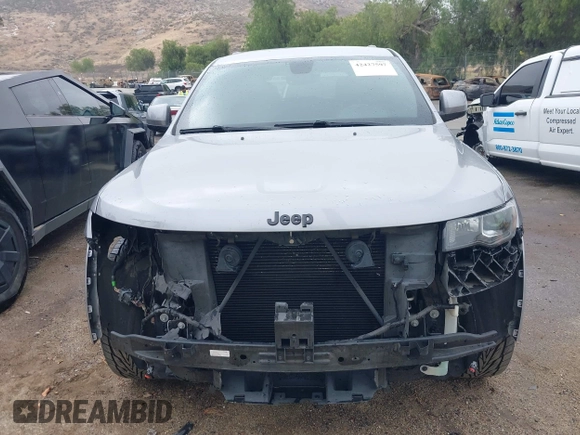 2017 Jeep Grand Cherokee Laredo with VIN 1C4RJEAG0HC702195, listed as a IAAI auction lot 42427597 with 104,403 mi miles and . Bid and sale history available at DreamBid. Image 13.