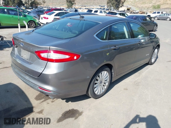 2013 Ford Fusion SE Hybrid with VIN 3FA6P0LU8DR178254, listed as a IAAI auction lot 42223543 with 139,995 mi miles and . Bid and sale history available at DreamBid. Image 4.
