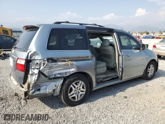 2006 Honda Odyssey EX-L z VIN 5FNRL38756B087695, wystawiony jako Copart lot #60122525 z przebiegiem 213 221 mil mil oraz Szkoda całkowita • Salvage title. Historia ofert i sprzedaży dostępna na DreamBid. Obrazek 3.