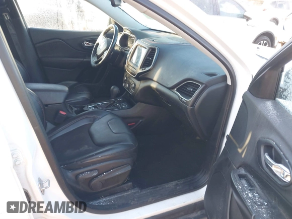 2019 Jeep Cherokee Trailhawk with VIN 1C4PJMBX8KD313712, listed as a IAAI auction lot 41448146 with 96,293 mi miles and . Bid and sale history available at DreamBid. Image 5.