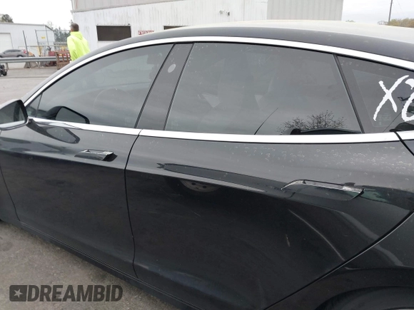 2018 Tesla Model S 75D with VIN 5YJSA1E24JF259874, listed as a IAAI auction lot 41921382 with 82,182 mi miles and . Bid and sale history available at DreamBid. Image 14.