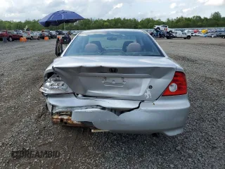 2005 Honda Civic EX with VIN 1HGEM22925L045823, listed as a Copart auction lot 55984995 with 245,821 mi miles and Salvage Title. Bid and sale history available at DreamBid. Image 6.