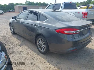 2017 Ford Fusion SE z VIN 3FA6P0H71HR410878, wystawiony jako IAAI lot #42135622 z przebiegiem 99 462 mil mil oraz . Historia ofert i sprzedaży dostępna na DreamBid. Obrazek 3.