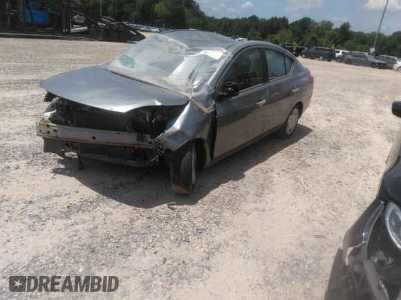 2012 Nissan Versa SV with VIN 3N1CN7AP1CL811531, listed as a IAAI auction lot 40465017 with 173,736 mi miles and . Bid and sale history available at DreamBid. Image 2.