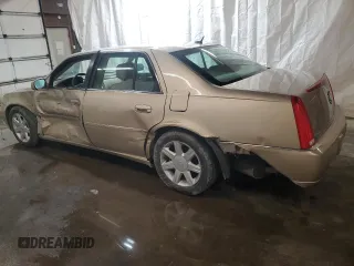 2006 Cadillac DTS 1SC z VIN 1G6KD57Y76U141402, wystawiony jako Copart lot #58715675 z przebiegiem 148 042 mil mil oraz Szkoda całkowita • Salvage title. Historia ofert i sprzedaży dostępna na DreamBid. Obrazek 2.