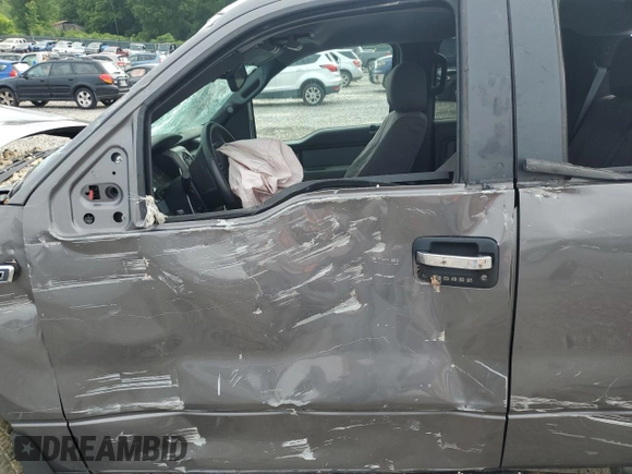 2012 Ford F-150 XL with VIN 1FTFW1EF3CFC92031, listed as a Copart auction lot 57265765 with 173,000 mi miles and Salvage title. Bid and sale history available at DreamBid. Image 7.