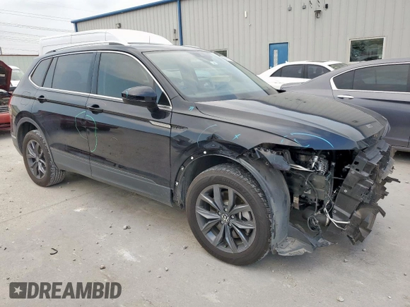 2023 Volkswagen Tiguan SE with VIN 3VVNB7AX2PM095304, listed as a Copart auction lot 56886785 with 29,894 mi miles and Salvage title. Bid and sale history available at DreamBid. Image 4.