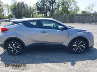 2020 Toyota C-HR LE z VIN NMTKHMBX6LR106469, wystawiony jako IAAI lot #41972012 z przebiegiem 51 316 mil mil oraz . Historia ofert i sprzedaży dostępna na DreamBid. Obrazek 13.