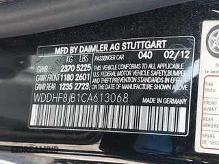 2012 Mercedes-Benz E with VIN WDDHF8JB1CA613068, listed as a IAAI auction lot 42119706 with 197,476 mi miles. Bid and sale history available at carsss.com. Image 9.