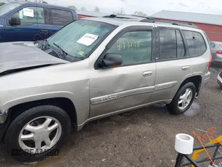 2003 GMC Envoy SLE with VIN 1GKDT13S932108979, listed as a IAAI auction lot 41938118 with 1 mi miles. Bid and sale history available at carsss.com. Image 14.
