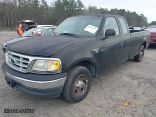 1999 Ford F-150 Work Series with VIN 1FTRX17W7XNC31381, listed as a IAAI auction lot 41734799 with 122,035 mi miles. Bid and sale history available at carsss.com. Image 17.