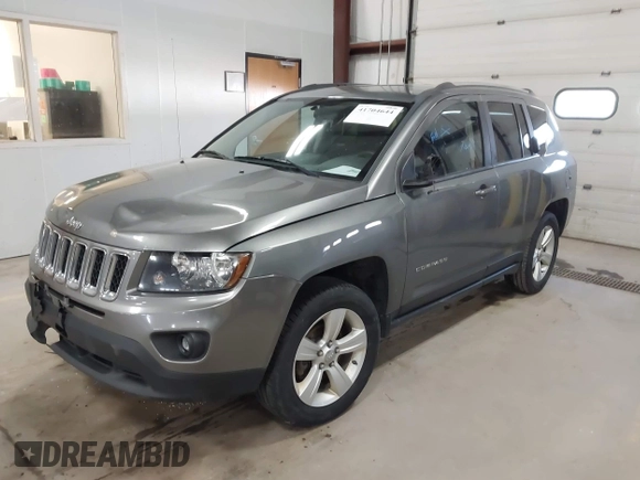 2014 Jeep Compass Sport with VIN 1C4NJDBB5ED567863, listed as a IAAI auction lot 41704644 with 163,405 mi miles. Bid and sale history available at carsss.com. Image 2.