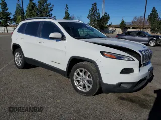 2015 Jeep Cherokee Latitude with VIN 1C4PJLCB9FW517961, listed as a Copart auction lot 41795735 with 131,089 mi miles and Salvage Title. Bid and sale history available at carsss.com. Image 4.