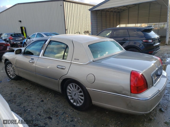 2005 Lincoln Town Car Signature with VIN 1LNHM81W45Y642069, listed as a Copart auction lot 79722163 with 220,886 mi miles and Salvage Title. Bid and sale history available at carsss.com. Image 2.
