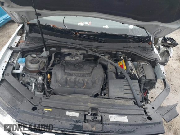 2018 Volkswagen Tiguan S with VIN 3VV1B7AX0JM041120, listed as a IAAI auction lot 42219662 with 160,852 mi miles and . Bid and sale history available at DreamBid. Image 10.
