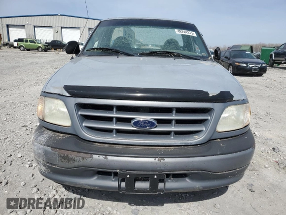 2001 Ford F-150 XL z VIN 2FTZF17261CA31704, wystawiony jako Copart lot #49744315 z przebiegiem 165 613 mil mil oraz Szkoda całkowita • Salvage title. Historia ofert i sprzedaży dostępna na DreamBid. Obrazek 5.