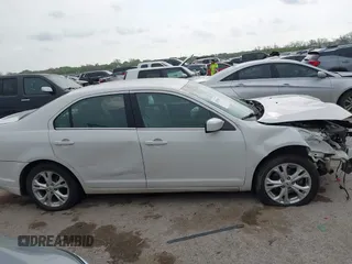 2012 Ford Fusion SE with VIN 3FAHP0HA8CR107691, listed as a IAAI auction lot 42058063 with 191,439 mi miles and . Bid and sale history available at DreamBid. Image 13.