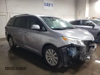 2012 Toyota Sienna XLE z VIN 5TDDK3DC5CS033868, wystawiony jako Copart lot #74727814 z przebiegiem 98 798 mil mil oraz Szkoda całkowita • Salvage title. Historia ofert i sprzedaży dostępna na DreamBid. Obrazek 4.