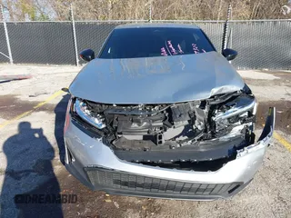 2025 Honda Civic Sport z VIN 2HGFE2F54SH513066, wystawiony jako IAAI lot #40995389 z przebiegiem 2 210 mil mil oraz . Historia ofert i sprzedaży dostępna na DreamBid. Obrazek 12.