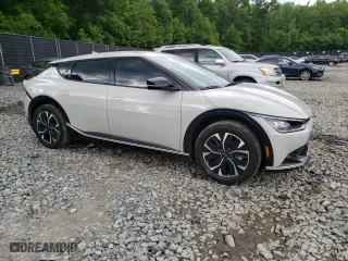 2022 Kia EV6 Wind with VIN KNDC34LA9N5059834, listed as a Copart auction lot 54963404 with 52,622 mi miles and Salvage Title. Bid and sale history available at carsss.com. Image 4.