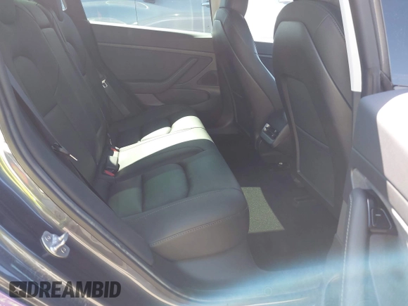 2020 Tesla Model 3 Standard Range Plus with VIN 5YJ3E1EA0LF739462, listed as a IAAI auction lot 42081889 with 65,254 mi miles. Bid and sale history available at carsss.com. Image 8.