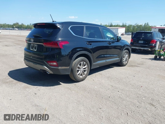 2019 Hyundai Santa Fe SE with VIN 5NMS23AD4KH088902, listed as a IAAI auction lot 42044465 with 34,302 mi miles and . Bid and sale history available at DreamBid. Image 4.