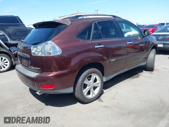2008 Lexus RX 400h with VIN JTJGW31U682006155, listed as a IAAI auction lot 42014215 with 164,540 mi miles and . Bid and sale history available at DreamBid. Image 4.