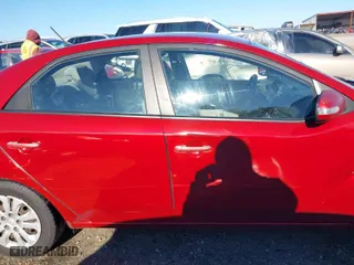 2010 Kia Forte EX with VIN KNAFU4A22A5302042, listed as a IAAI auction lot 41875786 with 236,529 mi miles. Bid and sale history available at carsss.com. Image 13.