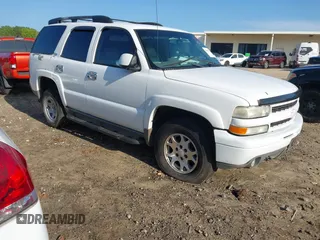 2001 Chevrolet Tahoe LT z VIN 1GNEK13T71R225256, wystawiony jako IAAI lot #42443173 z przebiegiem Nie podano mil oraz . Historia ofert i sprzedaży dostępna na DreamBid. Obrazek 1.