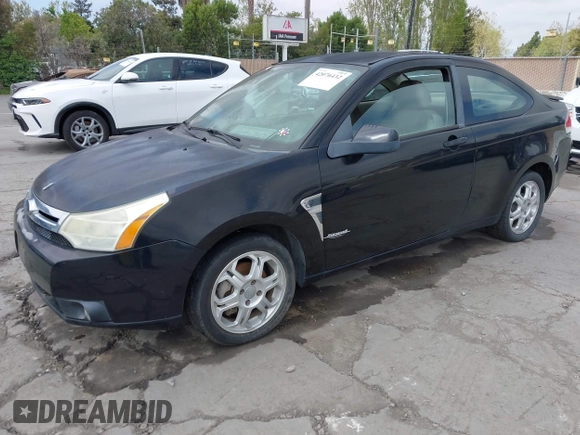 2008 Ford Focus SE with VIN 1FAHP33N38W107114, listed as a IAAI auction lot 42076432 with 124,487 mi miles. Bid and sale history available at carsss.com. Image 2.