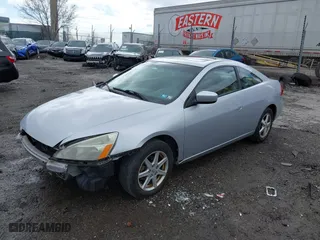 2003 Honda Accord Cpe EX with VIN 1HGCM82683A031630, listed as a IAAI auction lot 41816453 with 144,896 mi miles. Bid and sale history available at carsss.com. Image 18.