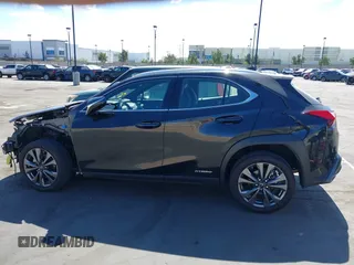 2021 Lexus UX with VIN JTHE9JBH5M2054228, listed as a IAAI auction lot 41651686 with 35,955 mi miles. Bid and sale history available at carsss.com. Image 15.
