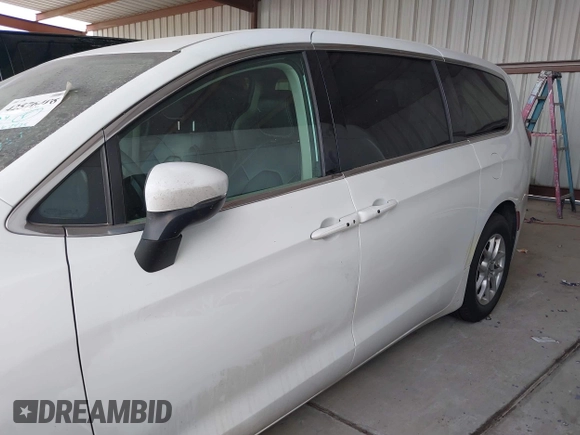 2023 Chrysler Pacifica Touring L with VIN 2C4RC1BG6PR550575, listed as a IAAI auction lot 42576498 with 54,373 mi miles and . Bid and sale history available at DreamBid. Image 14.