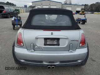 2005 MINI Convertible S with VIN WMWRH33575TK56034, listed as a Copart auction lot 88043565 with 33,410 mi miles and Salvage title. Bid and sale history available at DreamBid. Image 6.