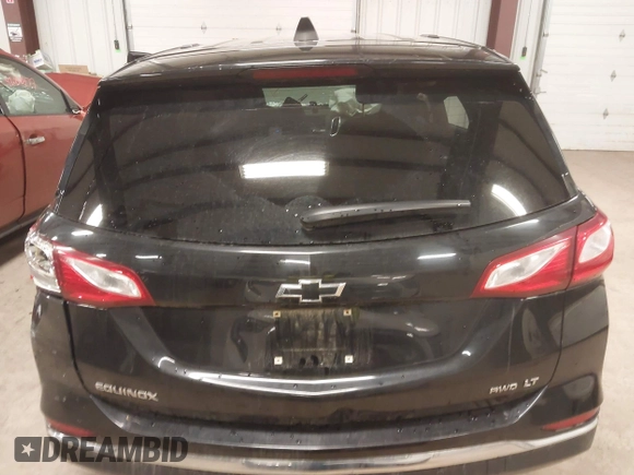 2019 Chevrolet Equinox LT z VIN 2GNAXUEV5K6243512, wystawiony jako IAAI lot #42008872 z przebiegiem 112 872 mil mil oraz . Historia ofert i sprzedaży dostępna na DreamBid. Obrazek 15.