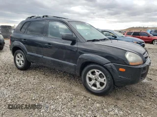 2009 Hyundai Tucson SE with VIN KM8JN72D49U975875, listed as a Copart auction lot 76923954 with 167,155 mi miles and Salvage Title. Bid and sale history available at carsss.com. Image 4.