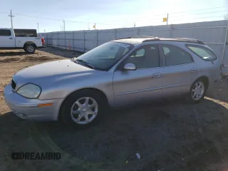 2000 Mercury Sable z VIN 1MEFM58U6YA612226, wystawiony jako Copart lot #80107064 z przebiegiem 186 885 mil mil oraz Tytuł czysty. Historia ofert i sprzedaży dostępna na DreamBid. Obrazek 1.