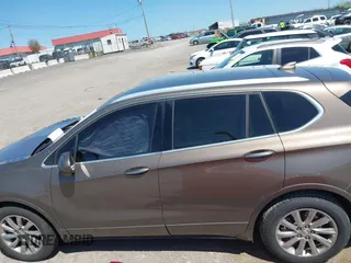 2019 Buick Envision Essence with VIN LRBFXCSA3KD043383, listed as a IAAI auction lot 42031599 with 96,754 mi miles and . Bid and sale history available at carsss.com. Image 14.
