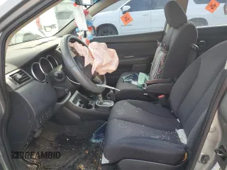 2007 Nissan Versa SL z VIN 3N1BC13E07L459929, wystawiony jako Copart lot #57472125 z przebiegiem 118 471 mil mil oraz Szkoda całkowita • Salvage title. Historia ofert i sprzedaży dostępna na DreamBid. Obrazek 7.
