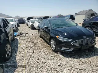 2017 Ford Fusion Hybrid SE with VIN 3FA6P0LU1HR266939, listed as a Copart auction lot 61018305 with 121,293 mi miles and Salvage title. Bid and sale history available at DreamBid. Image 13.