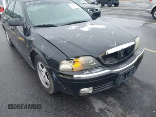 2001 Lincoln LS w/Base Pkg z VIN 1LNHM87A11Y601193, wystawiony jako IAAI lot #42341770 z przebiegiem 187 845 mil mil oraz . Historia ofert i sprzedaży dostępna na DreamBid. Obrazek 6.